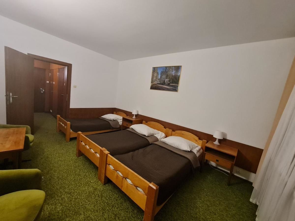 Отель Zespół Tatry - Hotel Tatry i Budynek Turystyczny Мужасихле